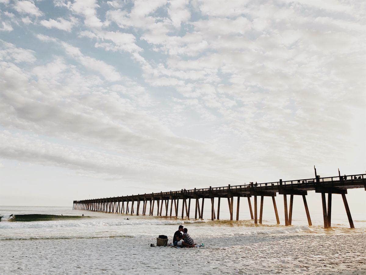 Beach and pier at sunset